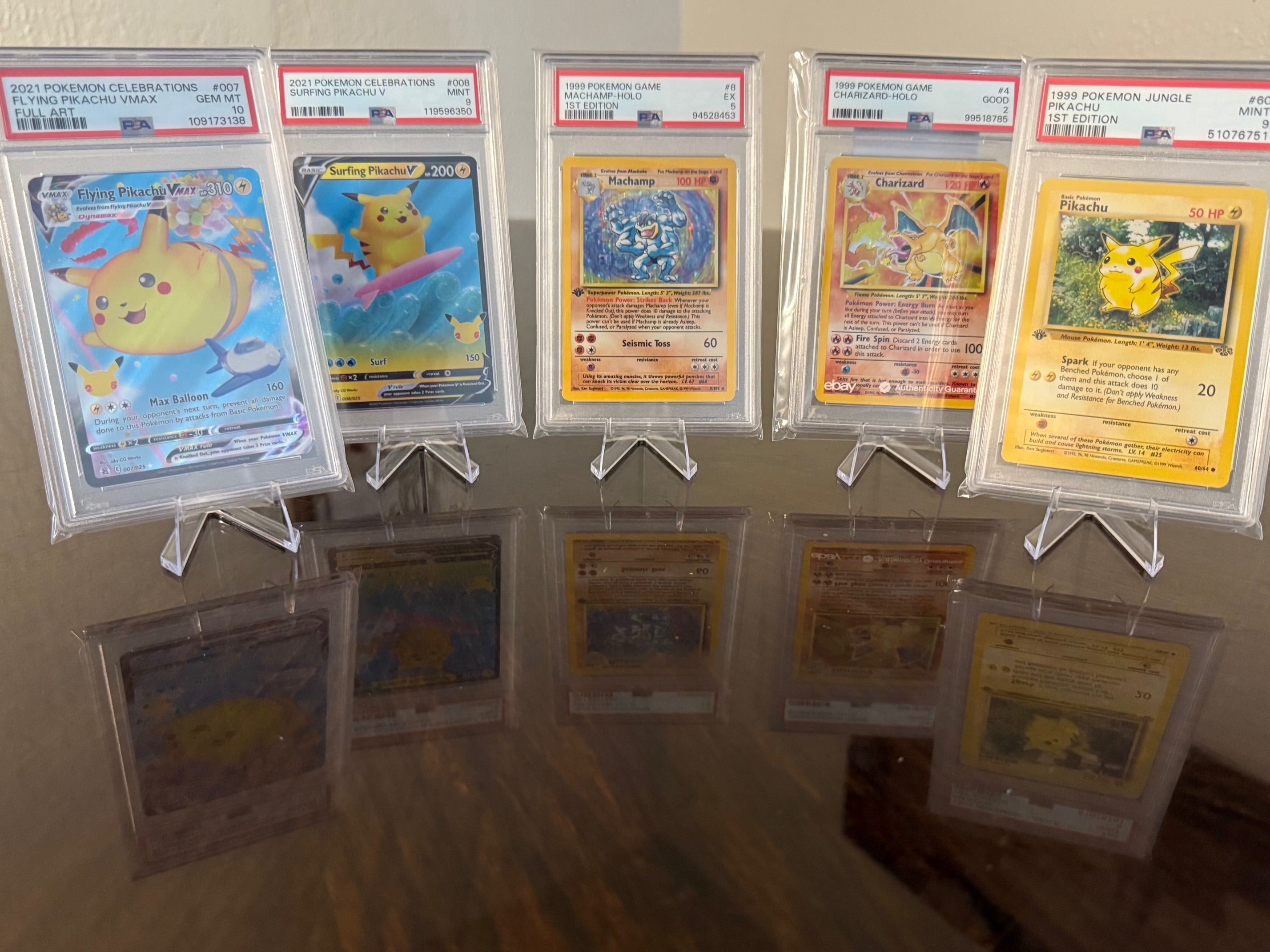 PSA Pokémon Lot Charizard Pikachu Machamp Surfing Flying VMAX Graded Cards NM+